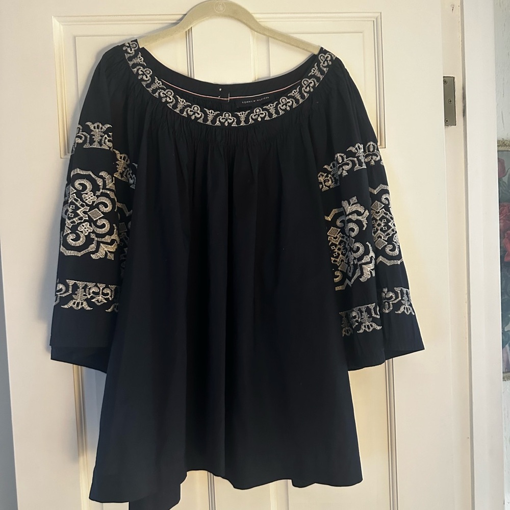 Navy blue Tommy Hilfiger blouse with cream embroidery.